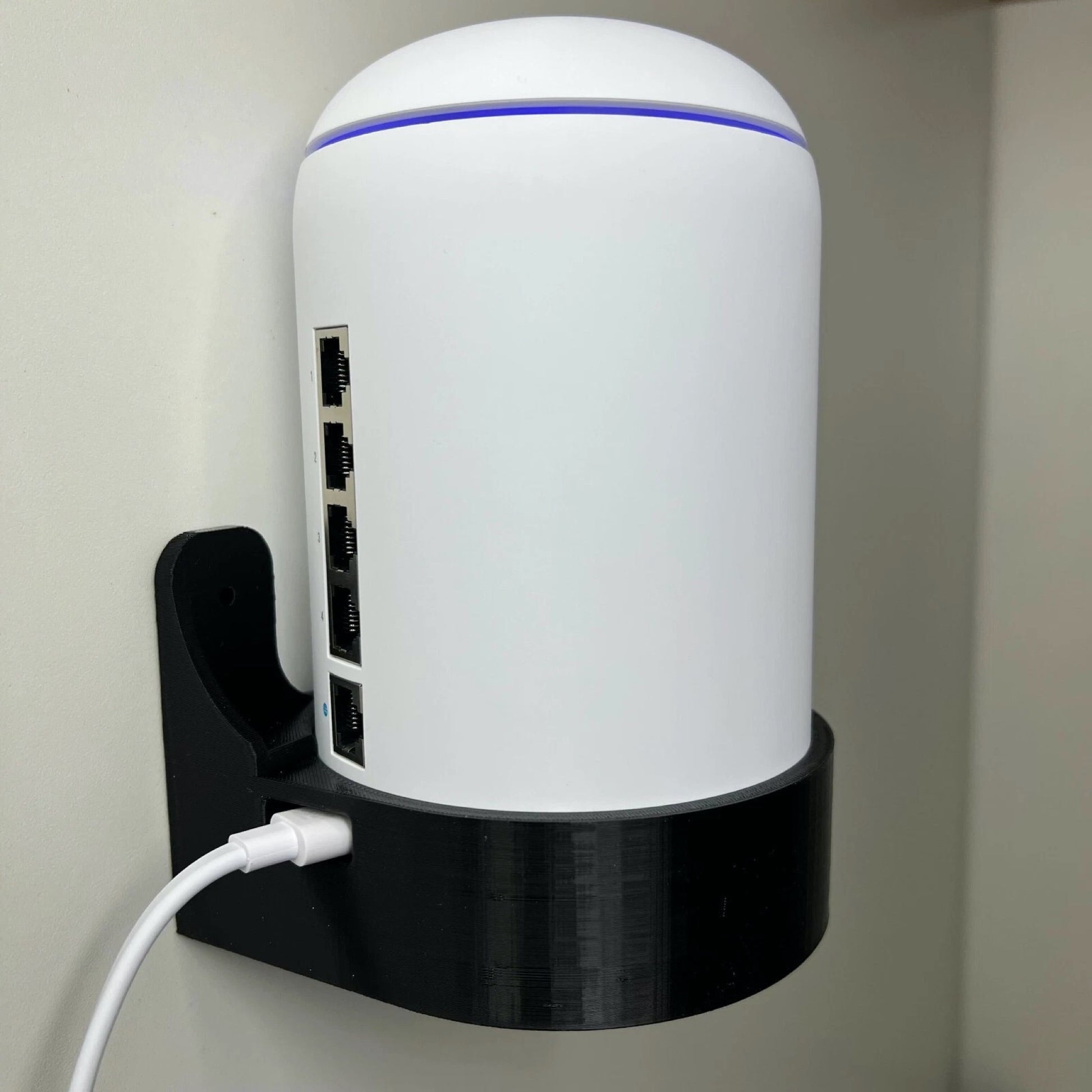 Front cradle view of Rack Forged wall mount for UniFi Dream Machine and Dream Router