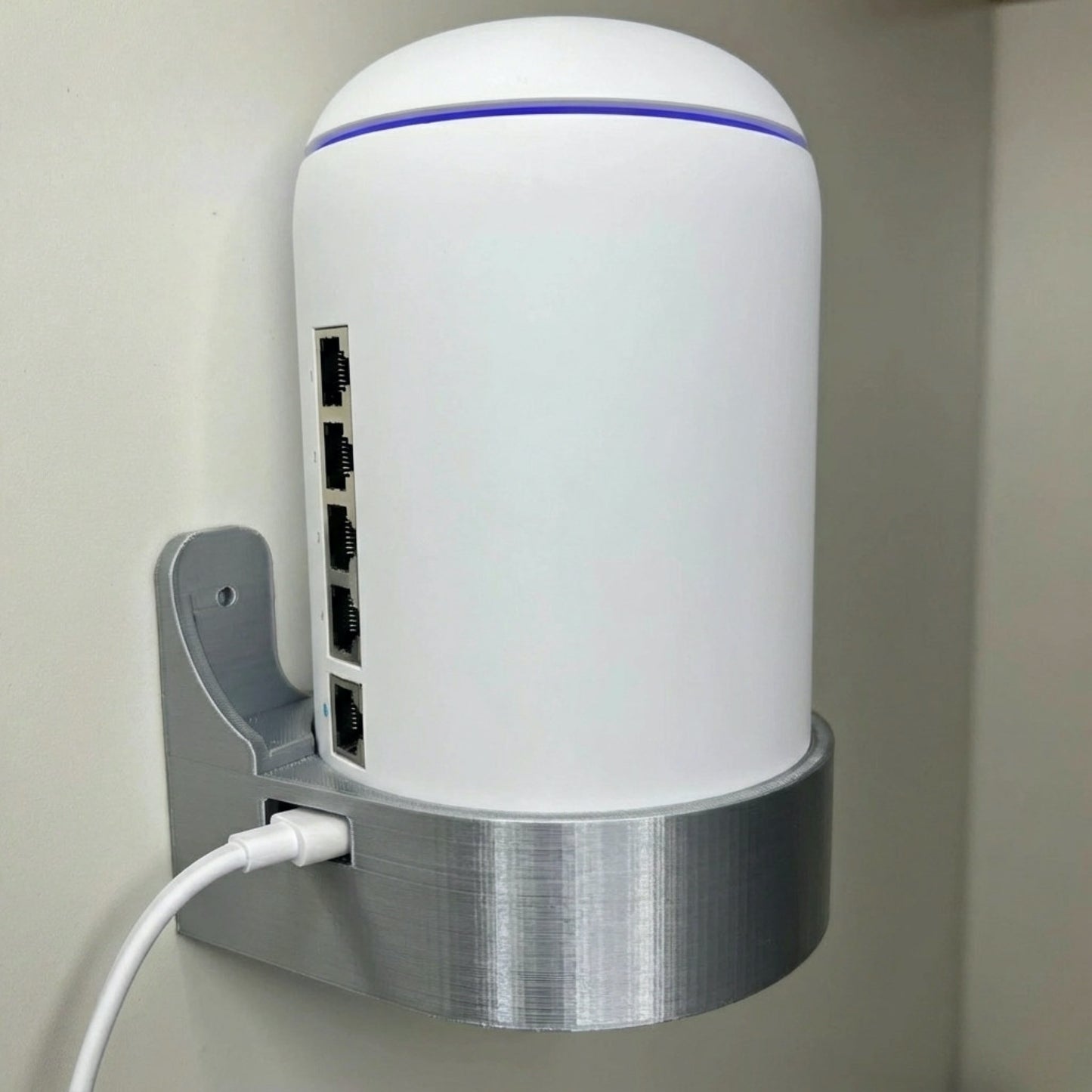 Rear mounting detail on Rack Forged wall mount for UniFi Dream Machine and Dream Router