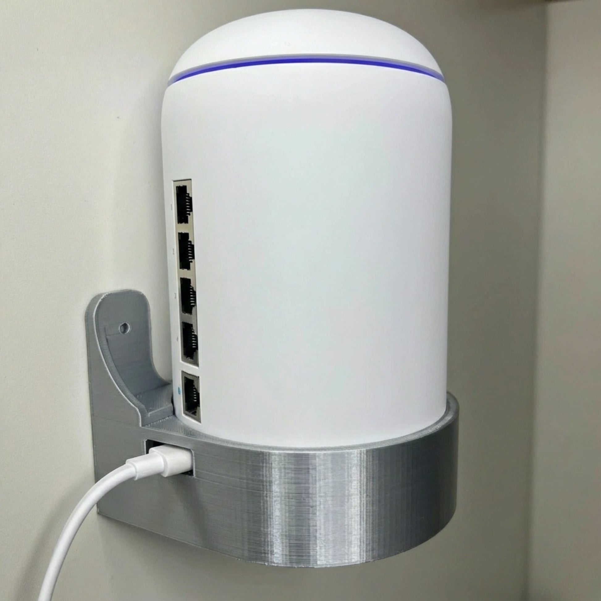 Rear mounting detail on Rack Forged wall mount for UniFi Dream Machine and Dream Router