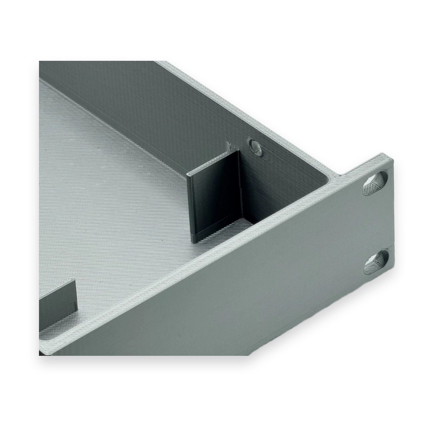 Close-up of the Rack Forged mount rack ears and screw holes