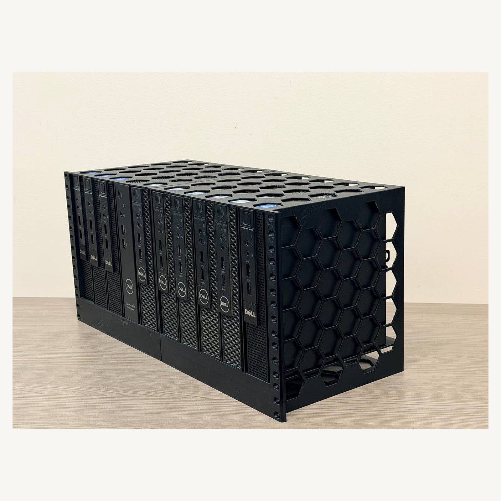 Three-quarter view of ten Dell Micro systems vertically organized in the 5U rack mount; computers not included