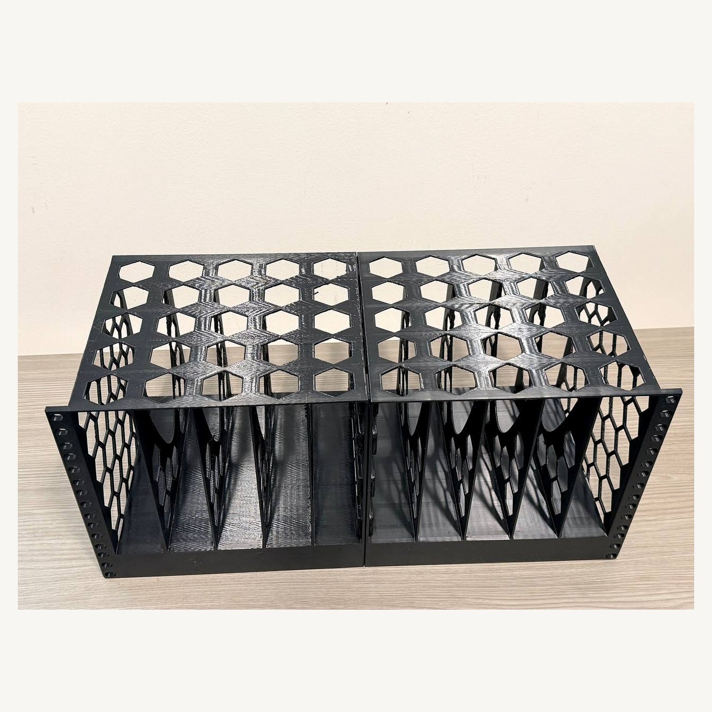 Empty vertical computer bays and ventilated side geometry on the Rack Forged 10-unit mount